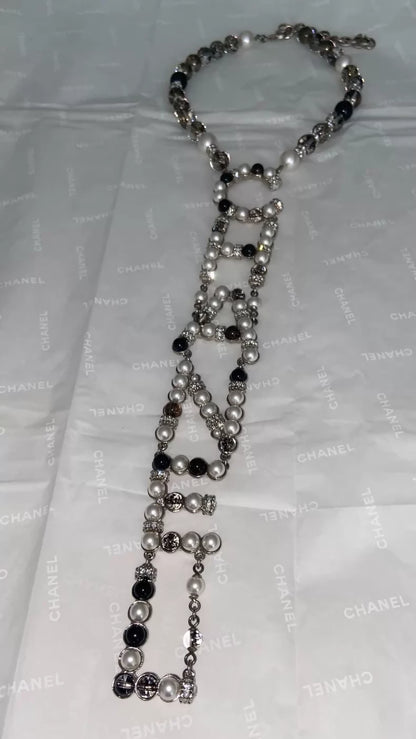 Chanel 19k Snow Collection Glass Letter Pearl Necklace