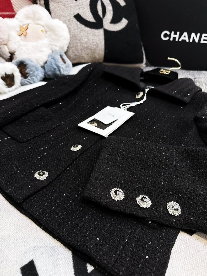 Chanel 25k black sequined tweed cropped jacket and skirt