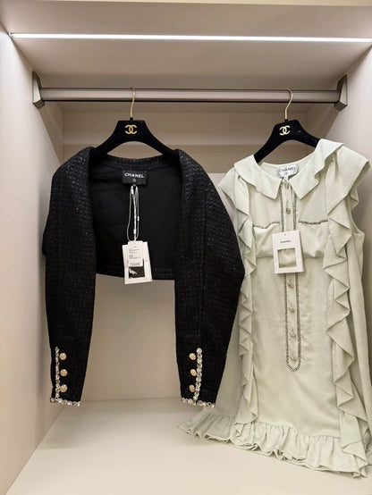 Chanel 23s black tweed jacket