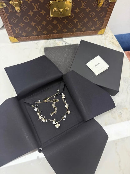 Chanel exquisite black and white enamel floral choker necklace