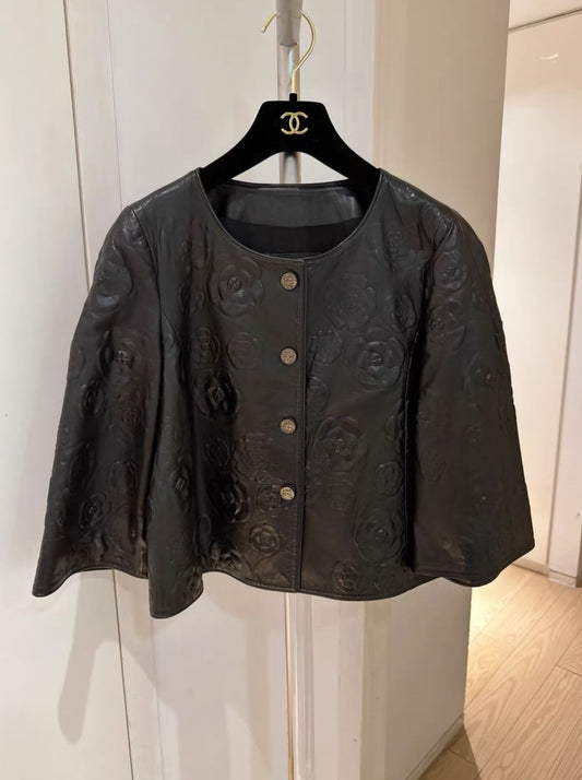 CHANEL Chanel Camellia Leather cape - 38 Coat - Vintage fashion from Wararni