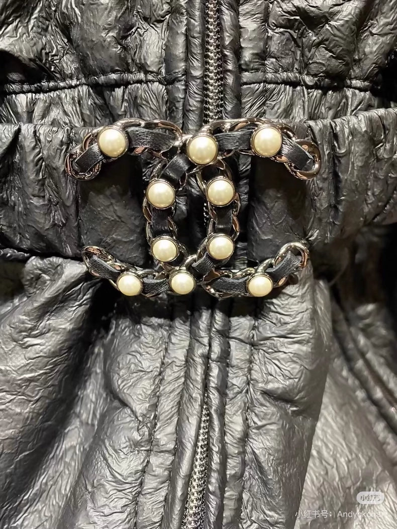 Chanel black leather jumpsuit with a warm wool lining