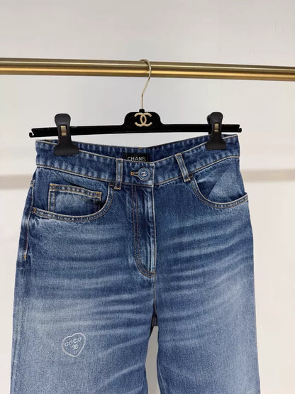 Chanel 24b heart embroidered graffiti blue straight leg jeans