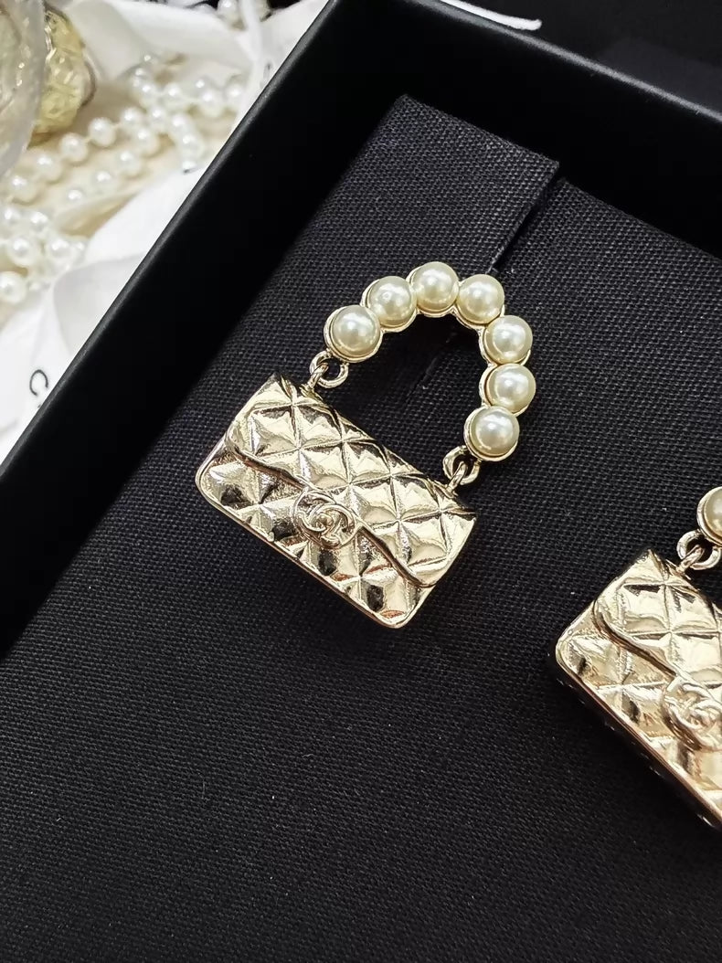 Chanel 21S light gold CF pearl quilted bag earrings