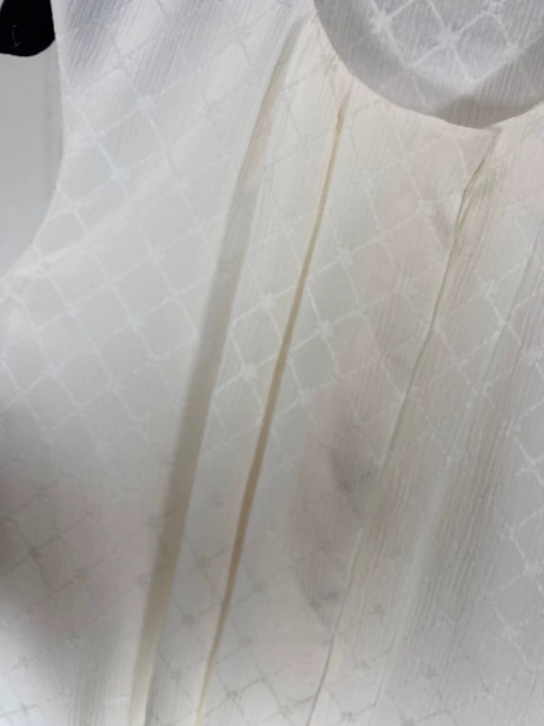 Chanel 21A beige quilted logo silk top