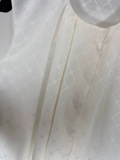 Chanel 21A beige quilted logo silk top