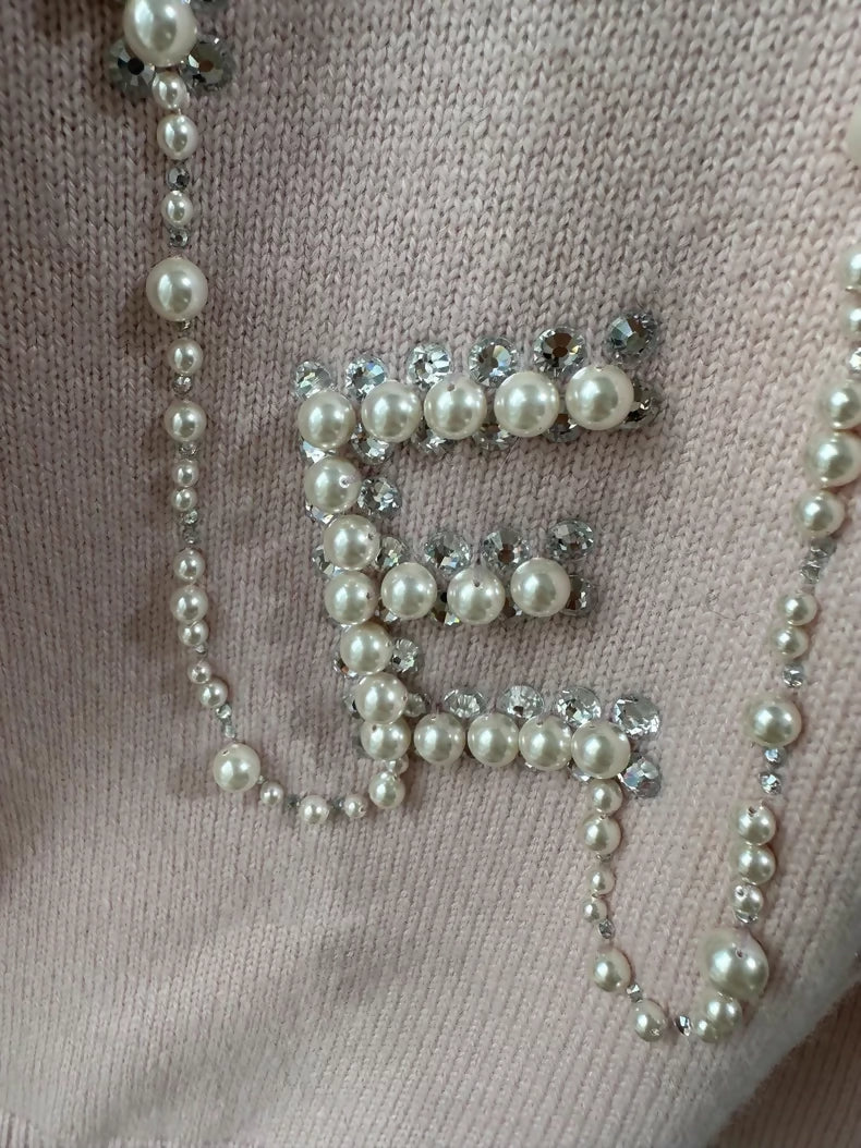 Chanel 21S pink cashmere sweater with pearl and rhinestone embroidery and letter embroidery