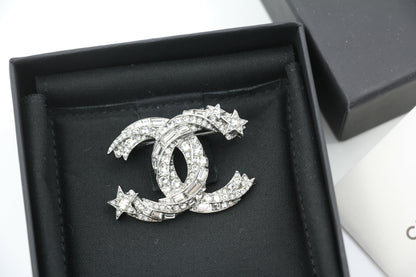 Chanel C21S Rhinestone Metallic Silver Star Twisted Brooch