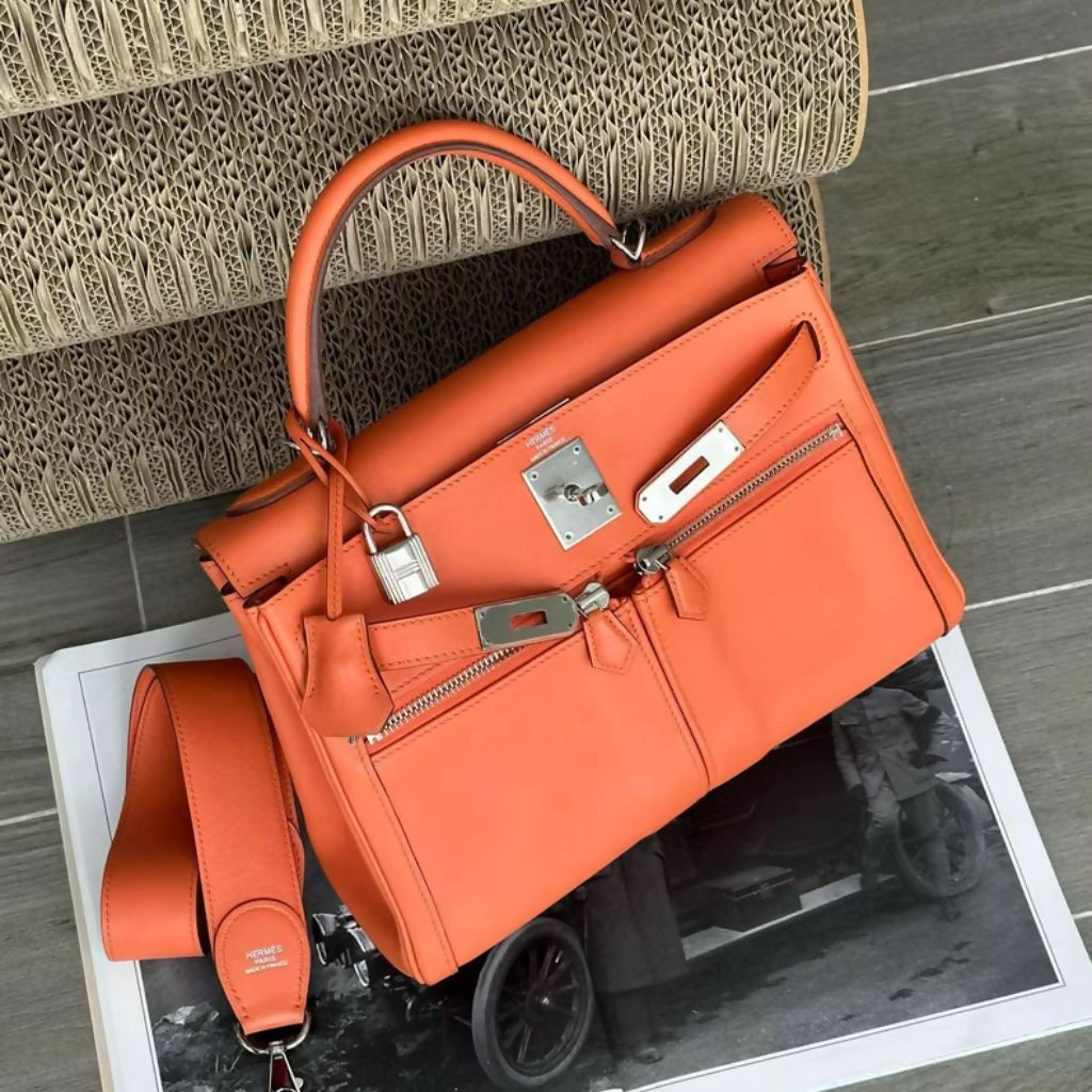 Hermès Kelly 28 Lakis orange swift leather palladium hardware