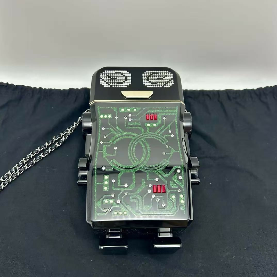 pre-owned chanel limited edition robot minaudière bag black plexiglass and crystals ruthenium hardware