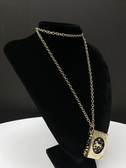 Chanel 22P lion magic book long necklace