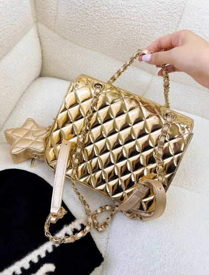 Chanel 24C gold mirror star backpack