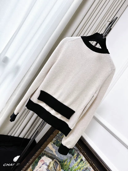Chanel 25K beige and black color-blocked knit top