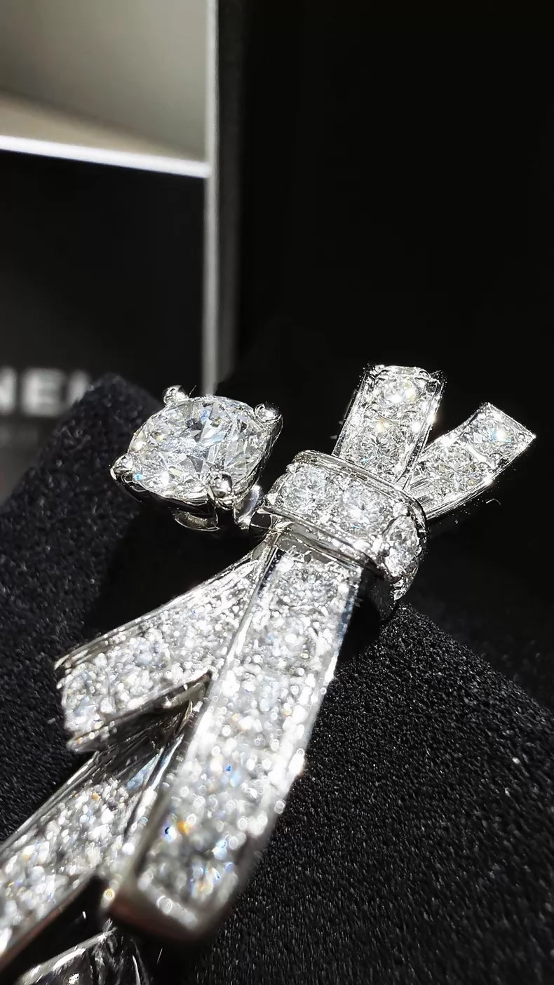 CHANEL earrings, white gold, full diamond bow, c