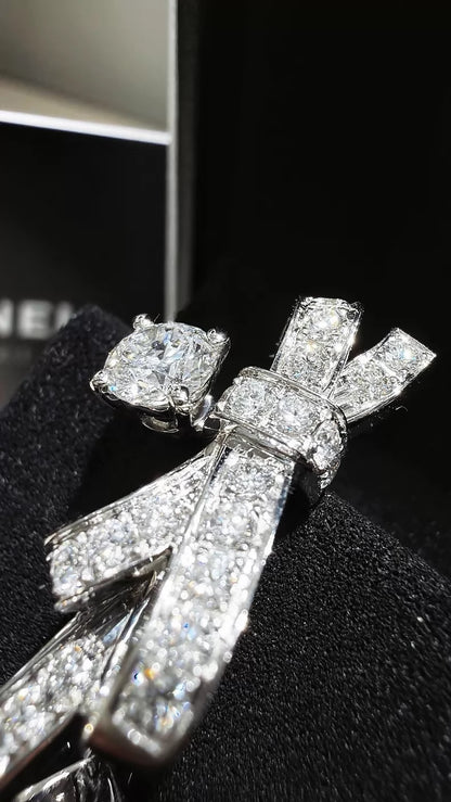 CHANEL earrings, white gold, full diamond bow, c