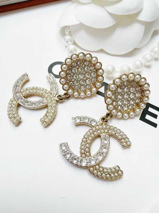 Chanel 21k pearl double C earrings