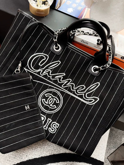 Chanel 23p black and white striped beach bag