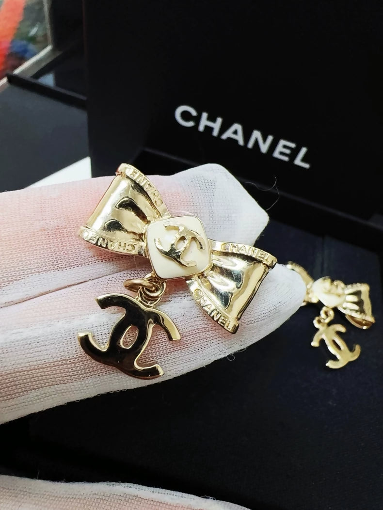 Chanel 22S bow double C earrings