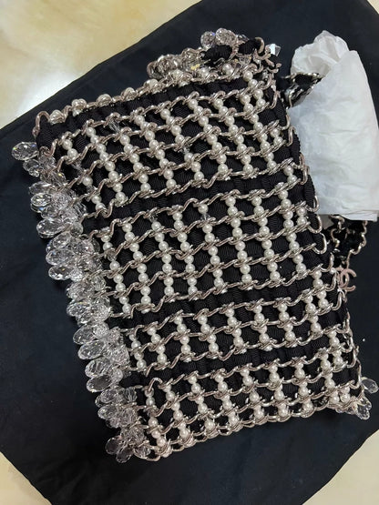 Chanel 19K Black and white tweed chain clutch bag