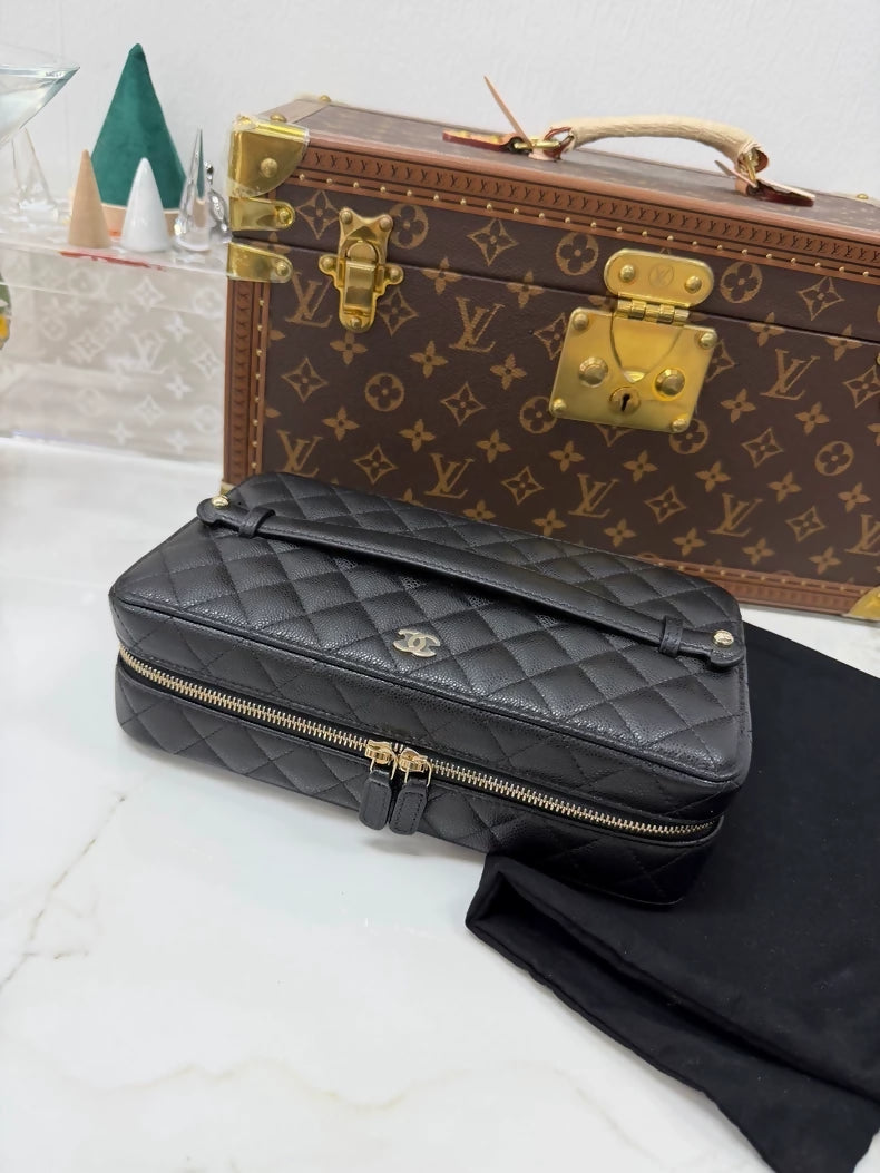 Chanel black leather cosmetic/jewellery box case