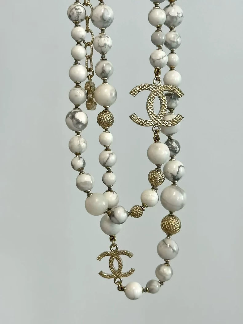Chanel 16A necklace marble pearls