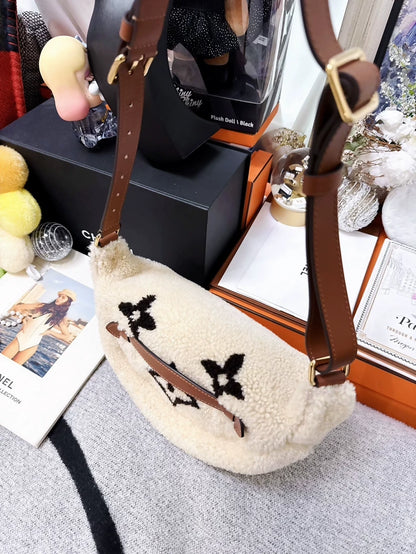 Louis Vuitton beige lamb wool teddy waist bag