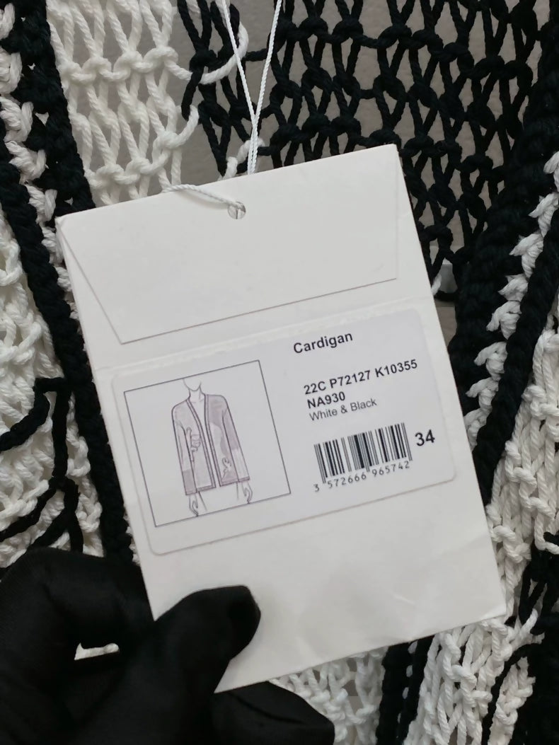 CHANEL 22C "Dove of Peace" white and black cardigan