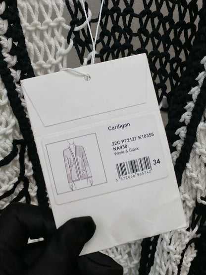 CHANEL 22C "Dove of Peace" white and black cardigan