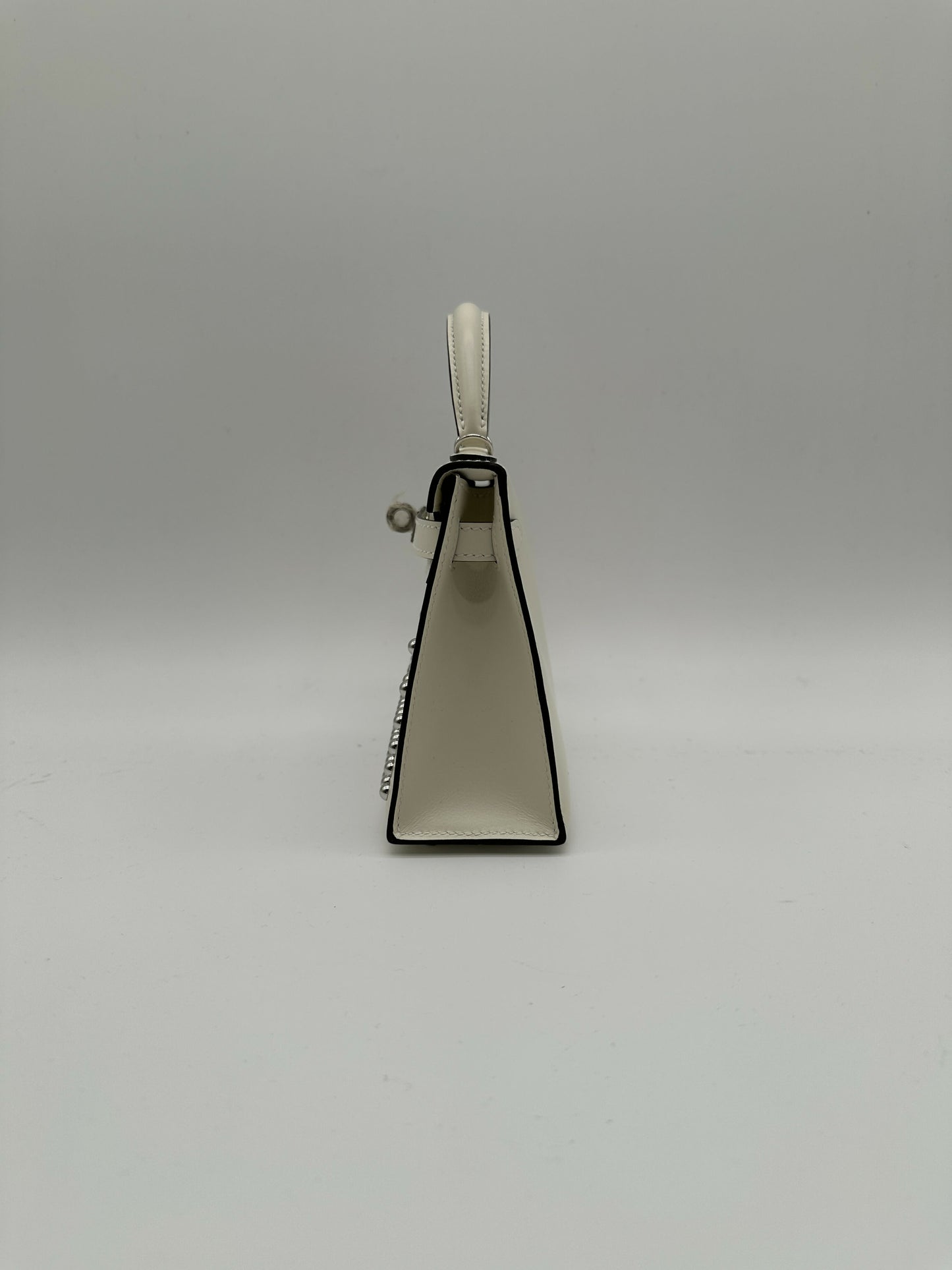 Hermès Kelly 20 Clouté Cream PHW G 2026
