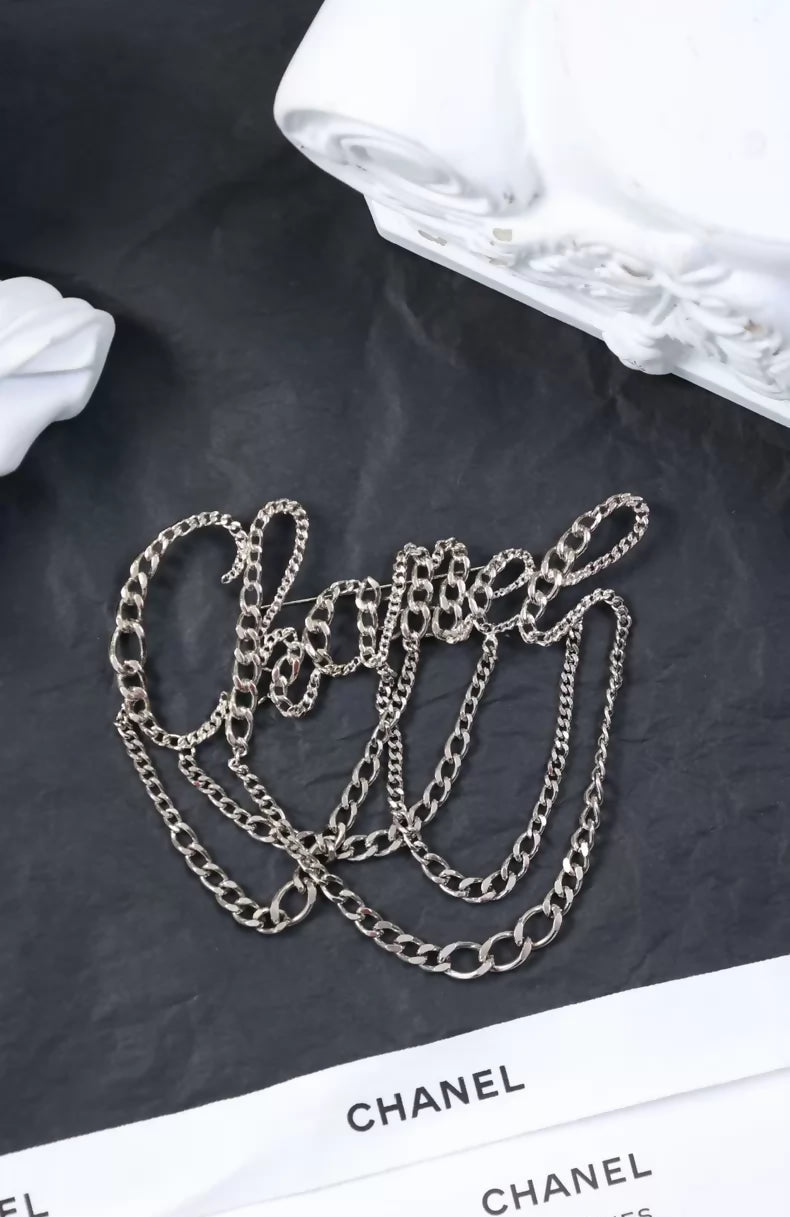 Chanel 2006 Silver Chain Letter Brooch