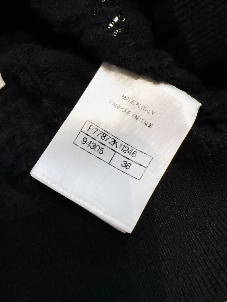 Chanel 24b black floral knit top with a large neckline