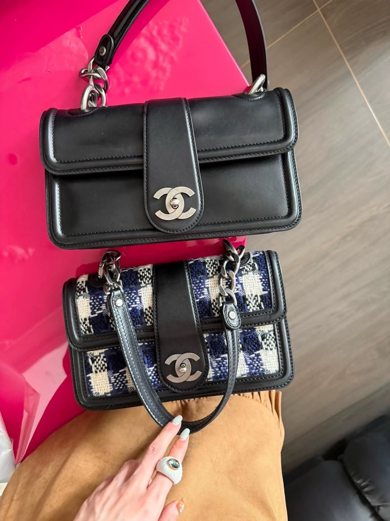 Chanel handbag in black and silver box calfskin with chain