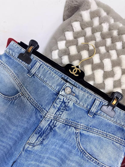 Chanel 25M blue jeans with embroidered lettering