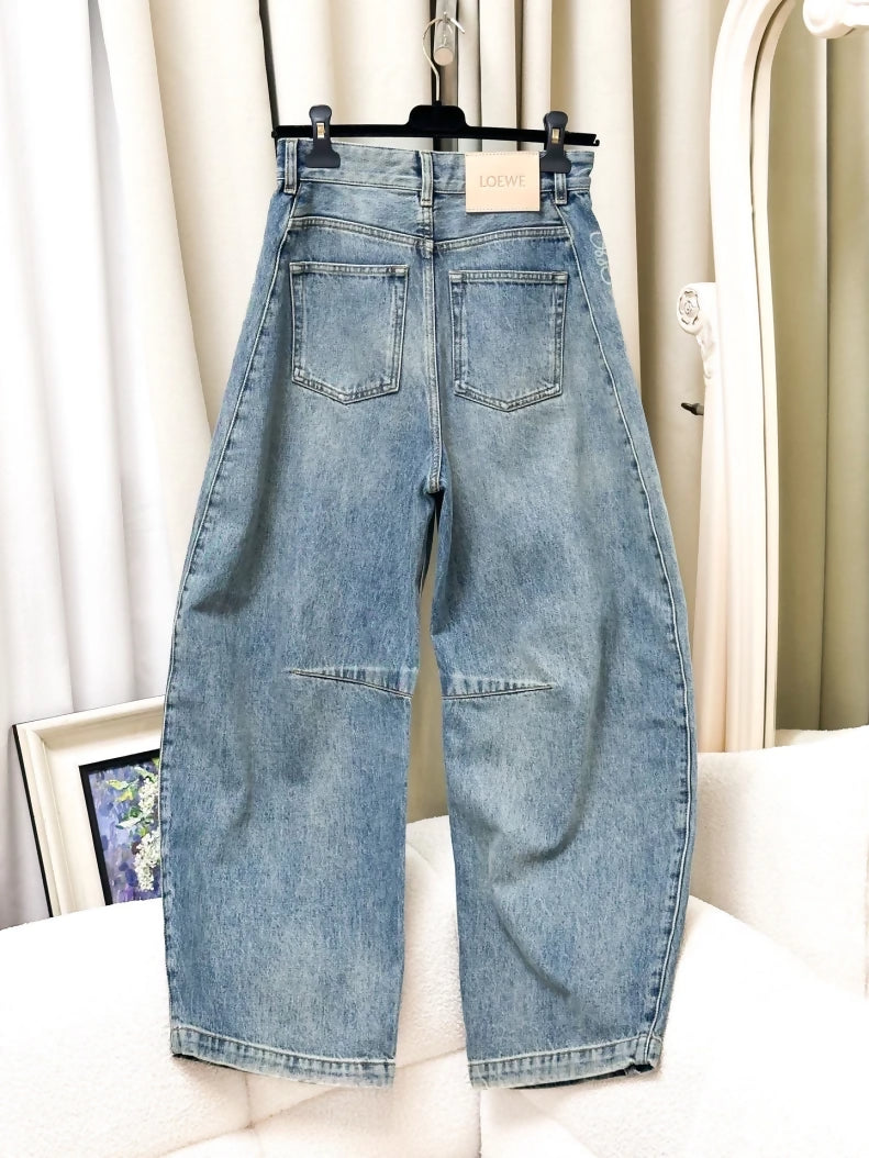 Loewe light blue washed distressed denim trousers
