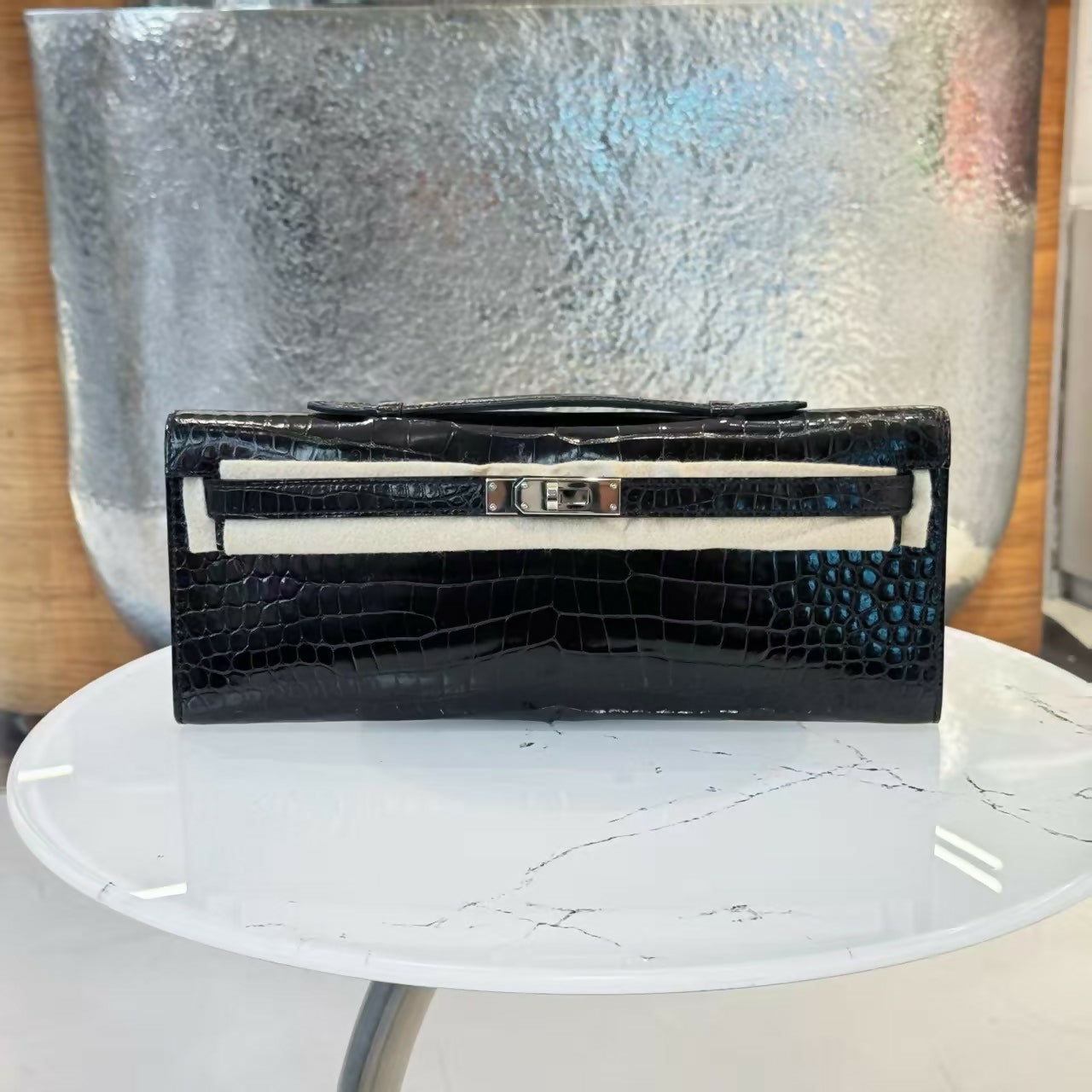 Hermes Kelly cut black shiny crocodile leather palladium hardware