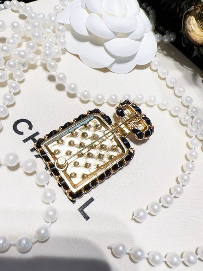 Chanel 23A quilted chain perfume bottle brooch