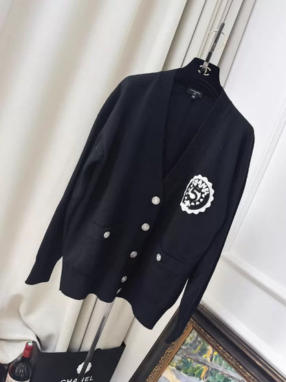 Chanel 23C Black Knit Cardigan with Embroidered Number 5 Badge