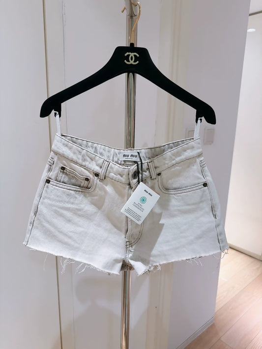 Miu Miu white distressed denim shorts