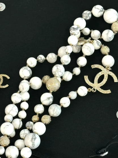 Chanel 16A necklace marble pearls