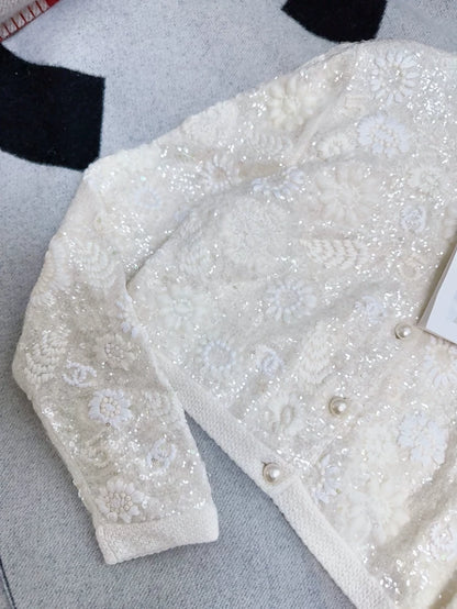 Chanel 21S ecru embroidered sequined camellia knit cardigan