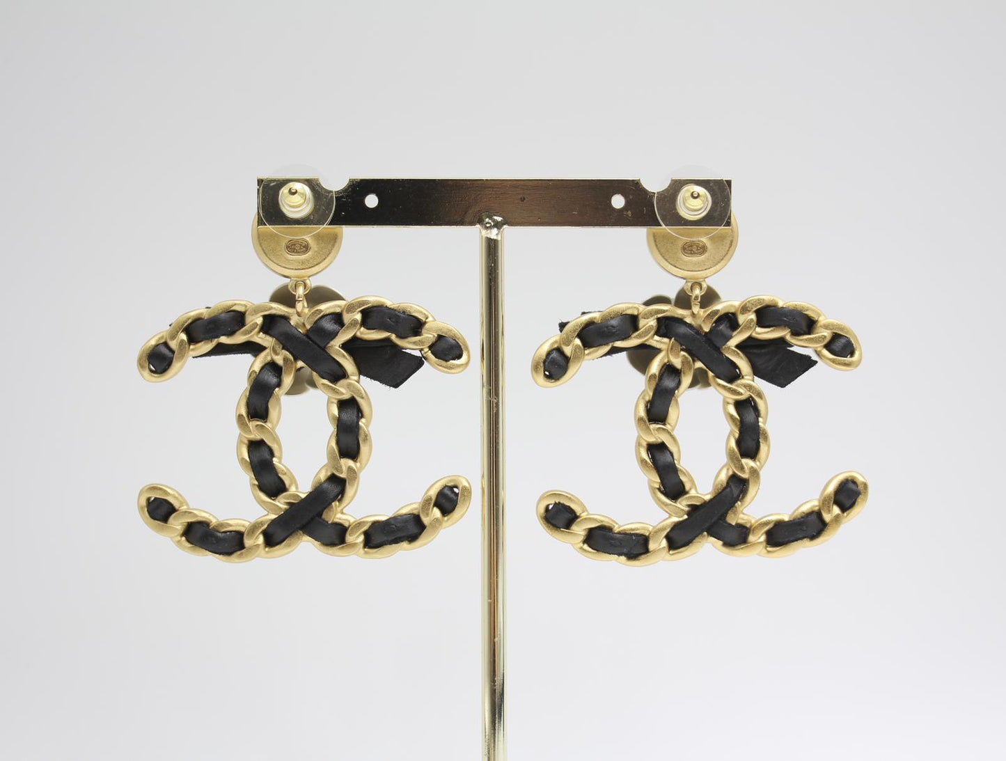 Chanel 20A Metal Leather Bow Camellia Earrings