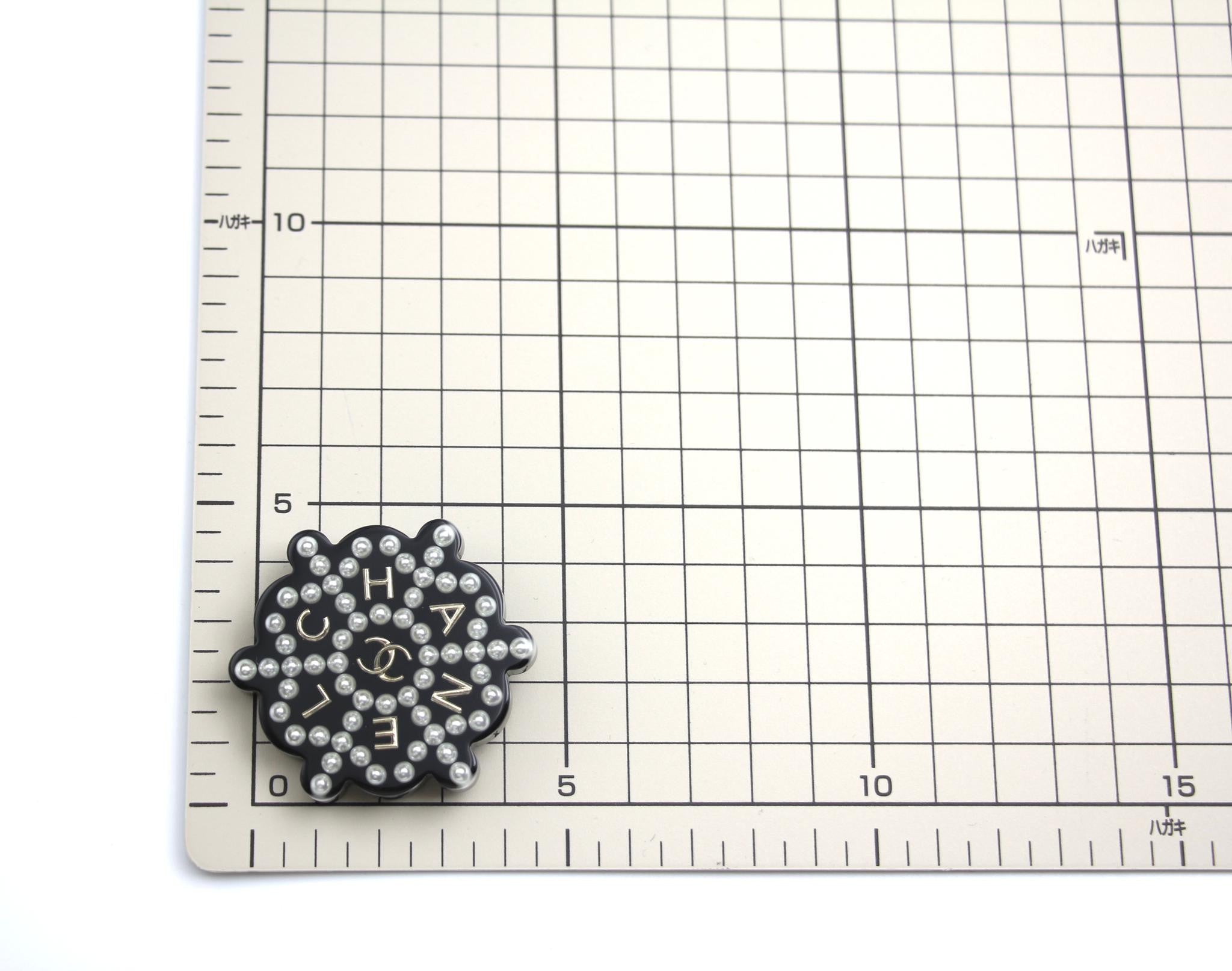 Chanel 18B Resin Imitation Pearl Snowflake Black And White Brooch
