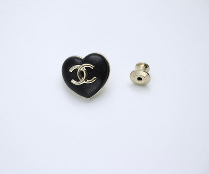 Chanel Vintage 22K Pale Gold Metal And Black Leather Heart Shape Round Buckle Brooch