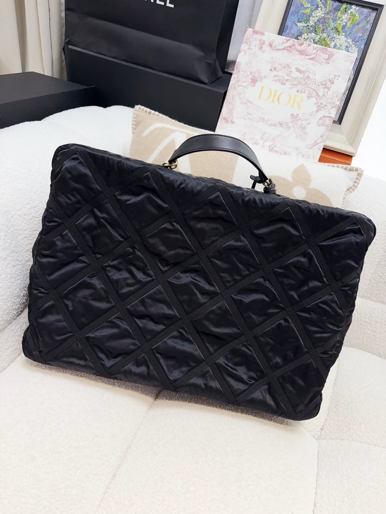 Chanel 22P travel box in black quilted nylon