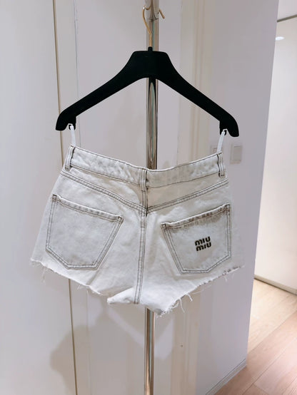 Miu Miu white distressed denim shorts