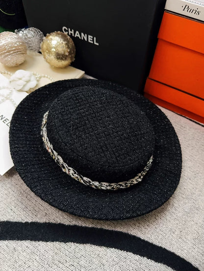 Chanel 25K black tweed hat with gold trim