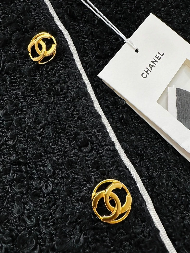 Chanel 26S black metallic logo woven cardigan, F36.