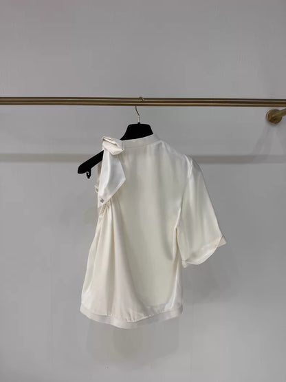 Chanel 24S ecru bow-tie satin off-the-shoulder blouse