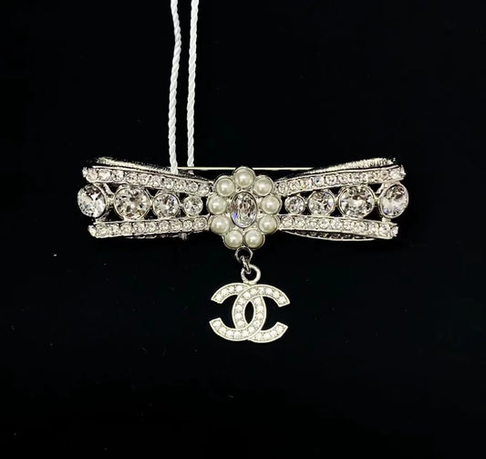 Chanel 23a brooch bow adorned with Swarovski crystals