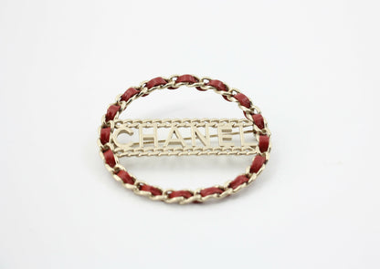 Chanel B18K Leather Red Metal Round Brooch